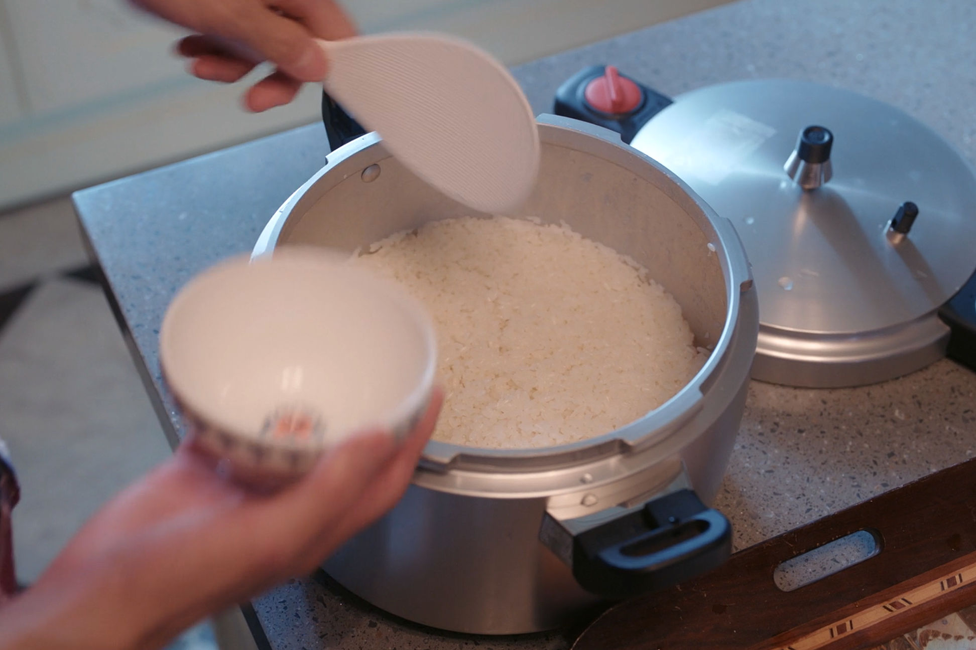 White rice is often boiled in a pressure cooker